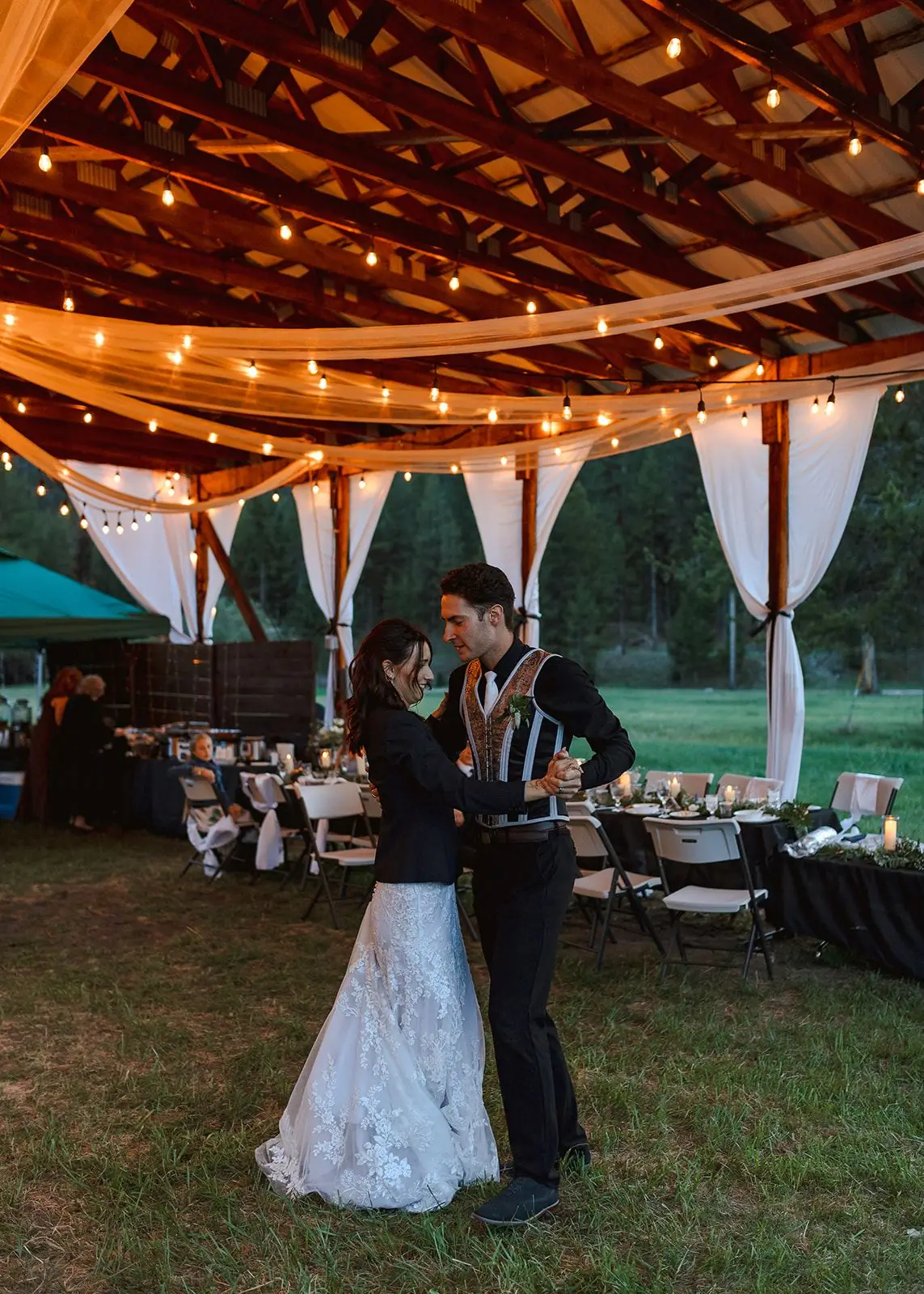 Close view of a wedding dance in the lit hangar